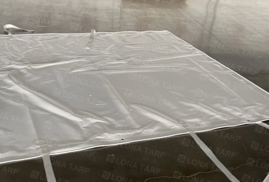 Vinyl tarp with grommets